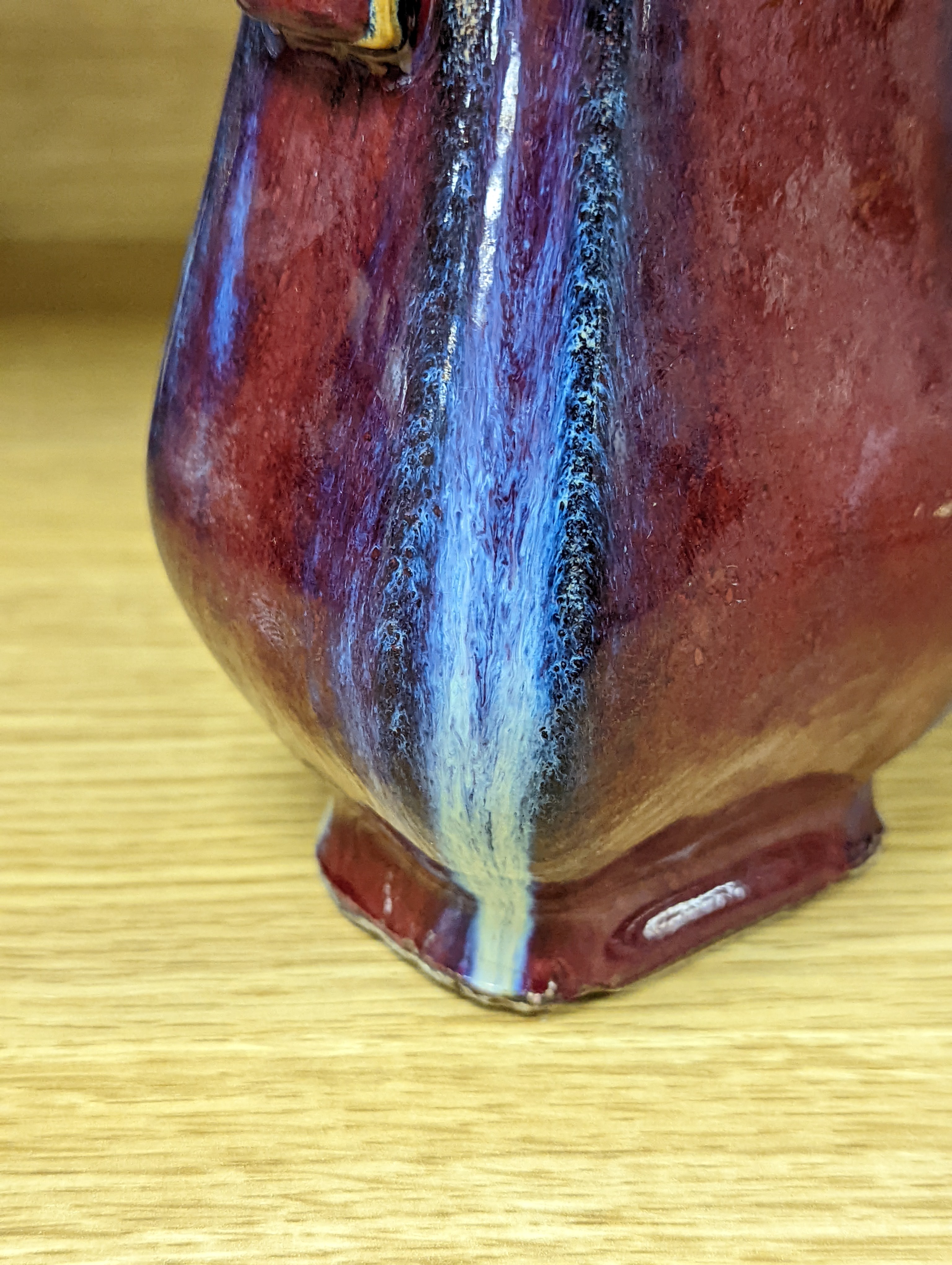 A Chinese sang de boeuf arrow vase 17cm